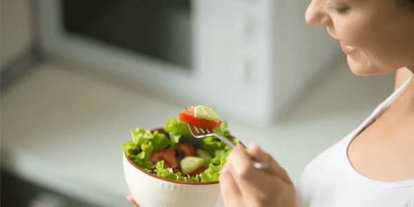 A Girl Eating Nutritious Food